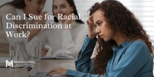 24 Can I Sue for Racial Discrimination at Work text on top of workplace