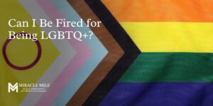 26 pride flag with text about being fired for being LGBTQ+