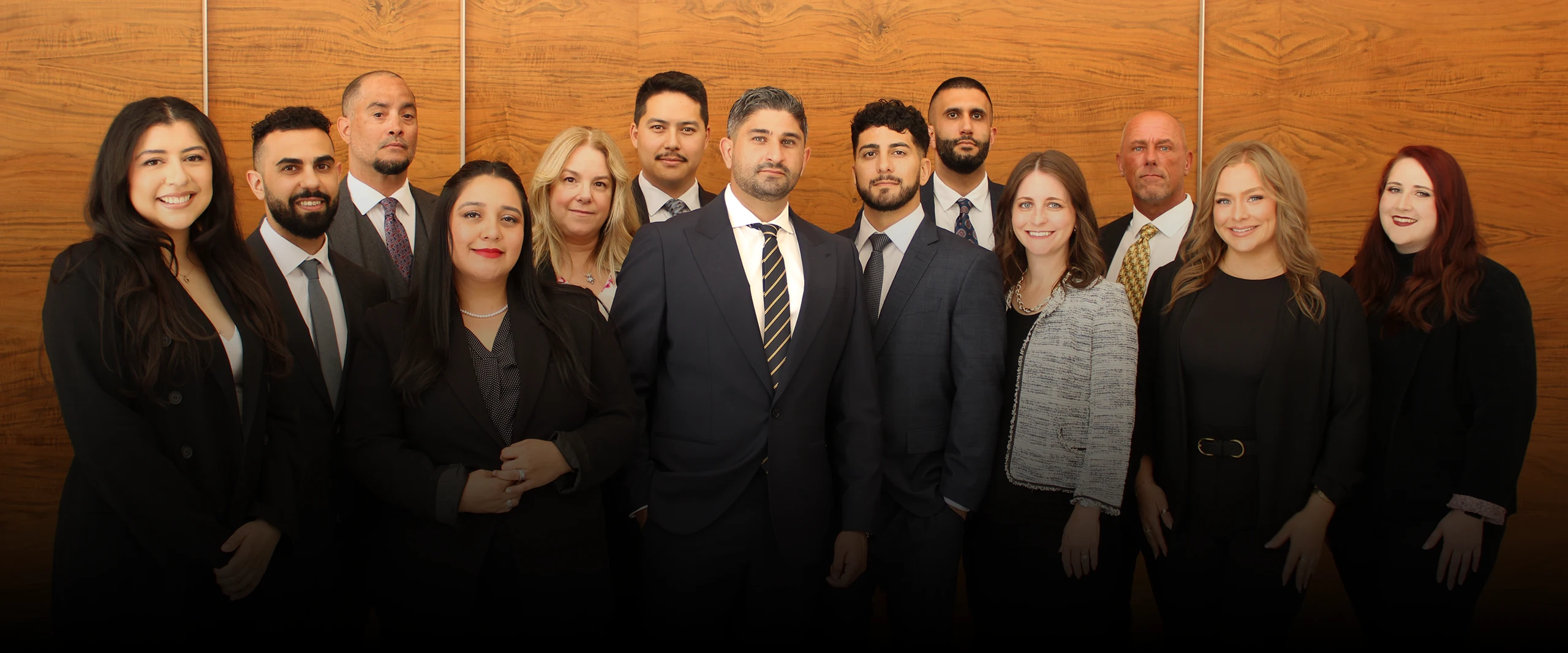mmlg banner 2025 gradient 2560x1067 Miracle Mile law group team of lawyers and client support staff